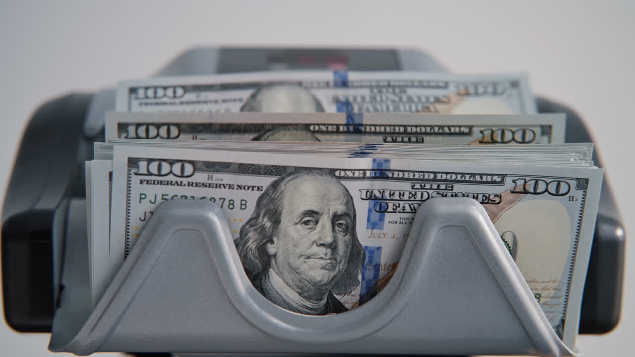 Bank automated equipment counting money closeup. Exchange currency in office