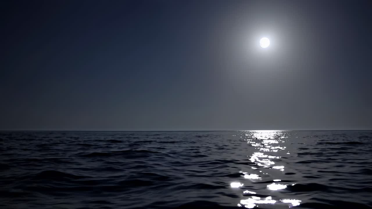 A serene night ocean scene with a full moon reflecting on the water