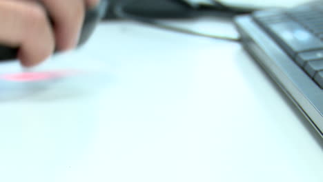 person using a computer mouse