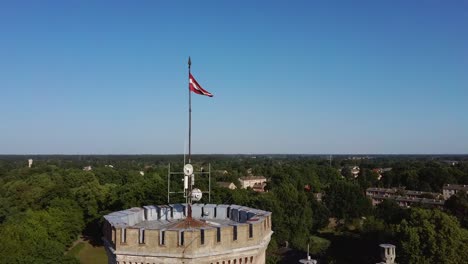 vecauce manor in latvia aerial view of the pink castle through the park