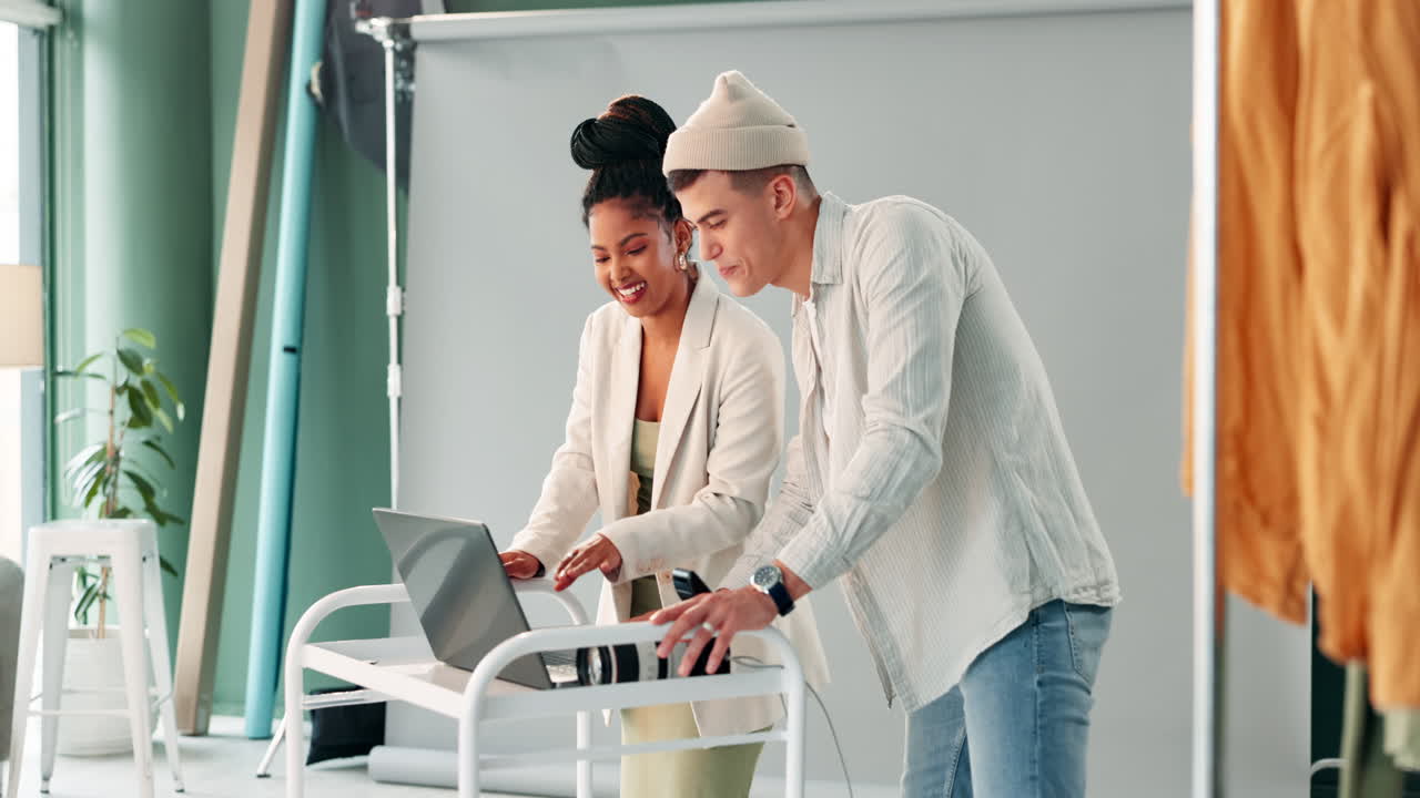 Two people working together in a studio