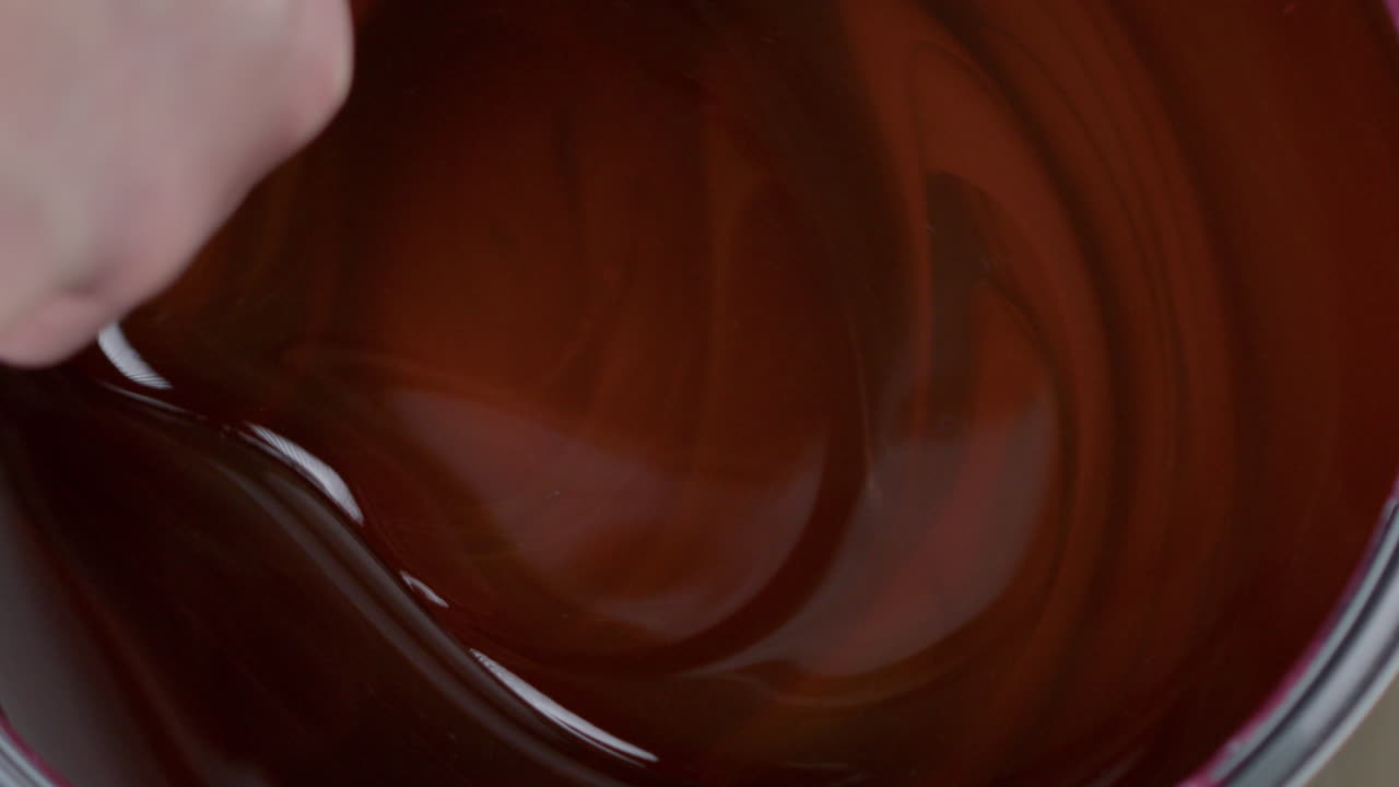 High Quality Video of a person opening a Farrow and Ball paint can. Close up capturing the start of a premium painting process with authentic hand detail