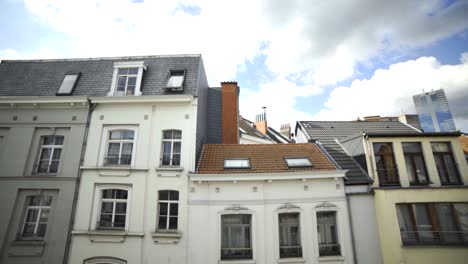 a view of urban rooftop apartments from the outside