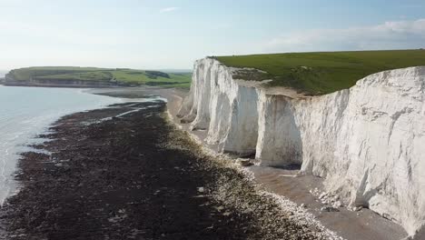 Seven-Sisters-chalk-cliffs,-coastal-hiking-trail,-United-Kingdom,-aerial-view