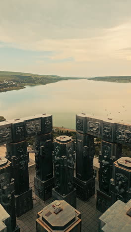 The Chronicles of Georgia monument overlooking a scenic lake near Tbilisi