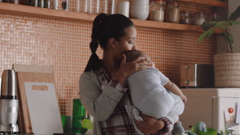 young mother holding baby calming restless toddler loving mom nurturing tired infant caring for her child at home