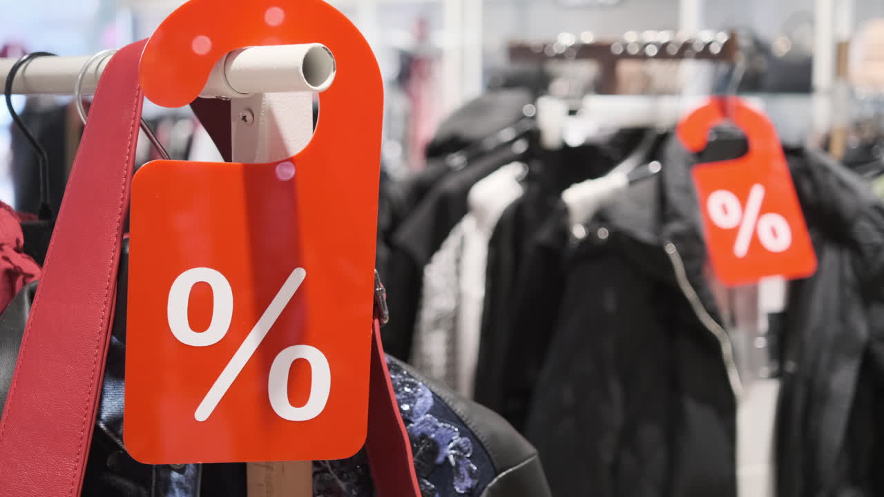 Seasonal and holiday discounts in clothing stores with a marked percentage of the price