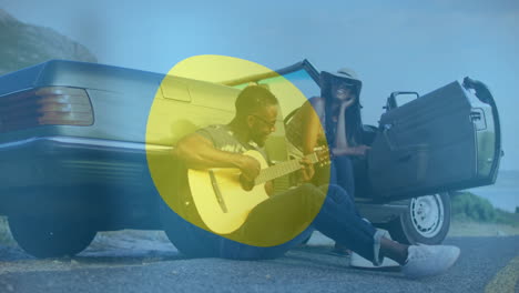 playing guitar by car, man engaging woman with music in outdoor setting