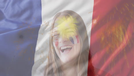 animación de la bandera de francia y fuegos artificiales sobre una mujer caucásica celebrando