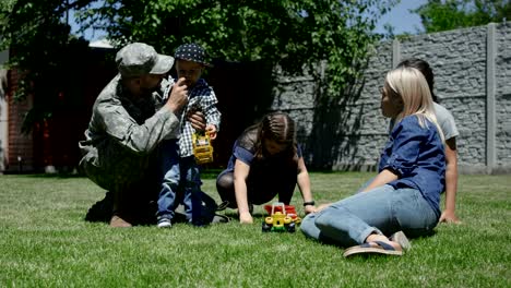 military man spending time with family