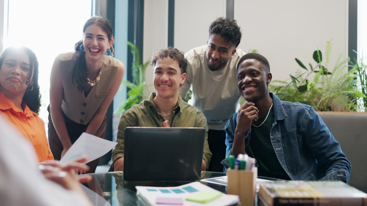 Diverse Group of Young Professionals Collaborating in a Modern Office Meeting
