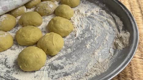 yellow rich dough ball healthy bread in home bake traditional bakery in village is ready after fermentation process in bakery in mountain in iran tourist attraction travel outdoor hiking healthy food