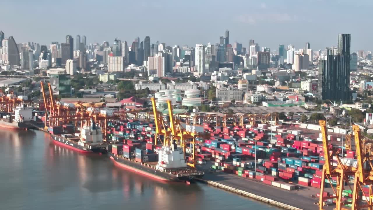 Cityscape of Bangkok showing shipping containers and tall buildings