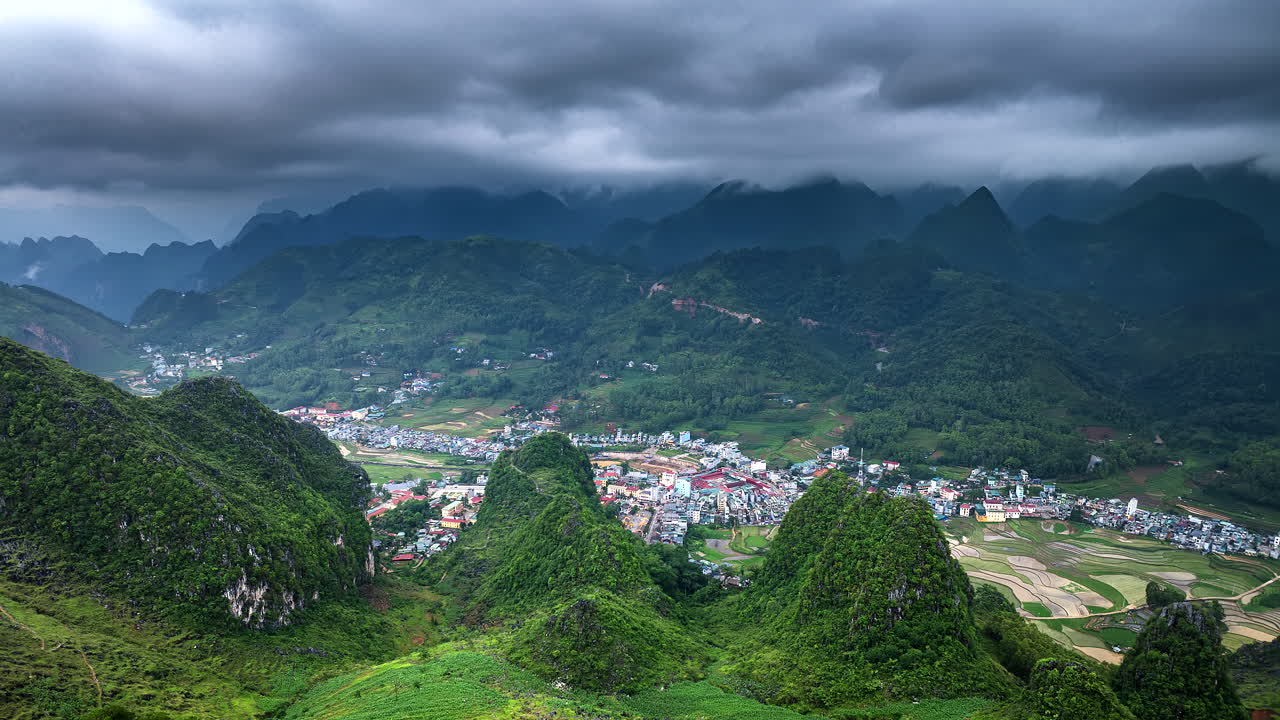 Typical green hills of Vietnamese landscape in Dong Van rural district, North Vietnam, Asia. Aerial sideways and Hyperlapse Timelapse