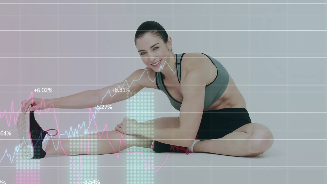 Woman tucking knees extending right leg stretching hamstring for workout while pulsing graphs over