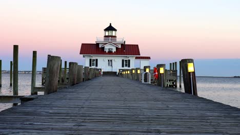 Roanoke-Marsh-Light-in-Manteo,-NC-with-beautiful-gradient-sunset-sky-background