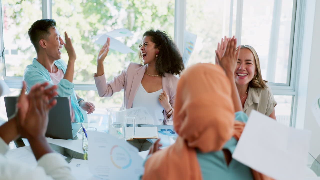 Applause, winner or high five with a business team