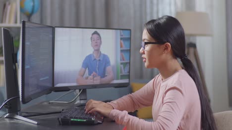 Teenager learning online from a teacher