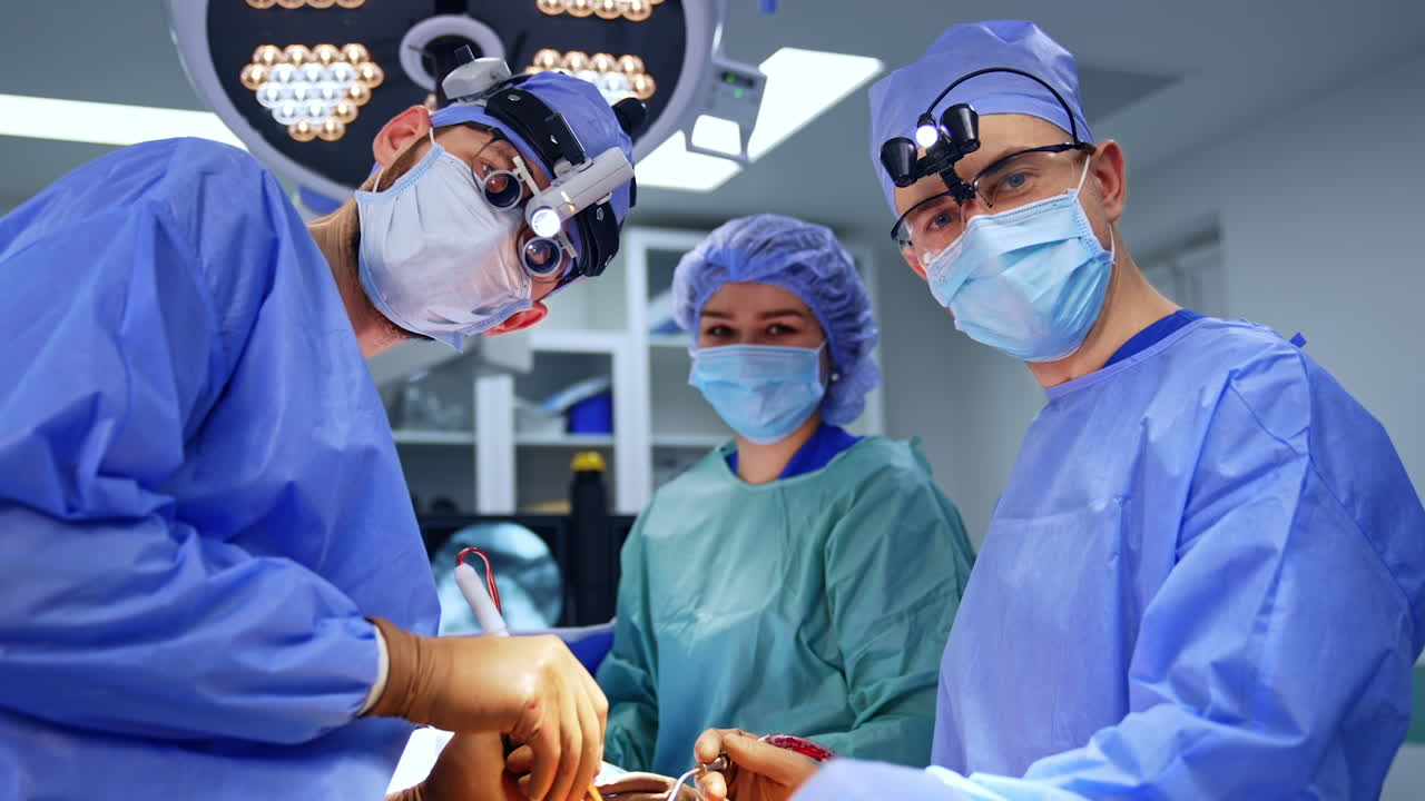 Team of neurosurgeons operating in modern hospital. Team of neurosurgeons operating in a modern hospital with advanced medical equipment