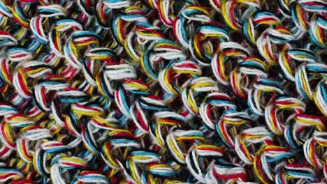 multicolor braided yarn thread background. - macro