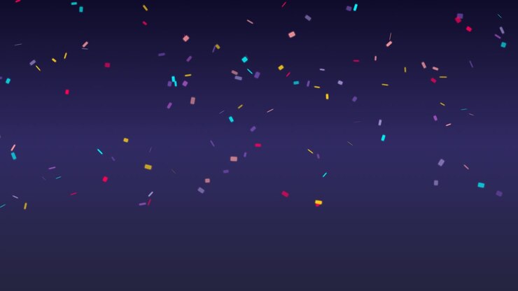 Colorful Confetti Falling Against a Dark Blue Gradient Background