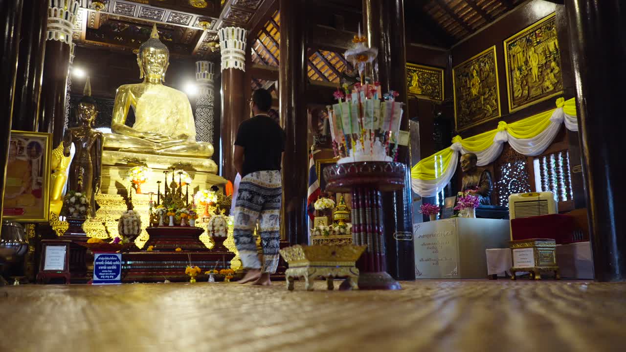 Golden Buddha Statue and Temple Interior