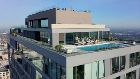 luxury rooftop pool and penthouse with city views