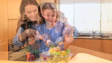 madre e hija cocinando juntos