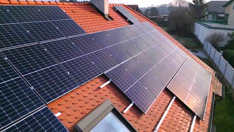 Solar-Panels-On-The-Red-Brick-Roof-In-Countryside-Village