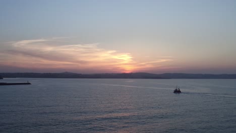 Trawler-coming-home-after-fishing-Devon-UK