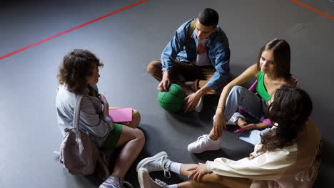 teenagers giving five to friend