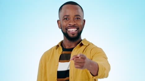 pointing, you and happy black man on blue