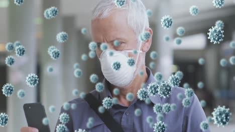 animation of covid 19 cells over senior man wearing face mask