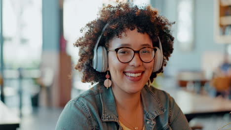 Music,-relax-and-smile-with-black-woman-in-cafe