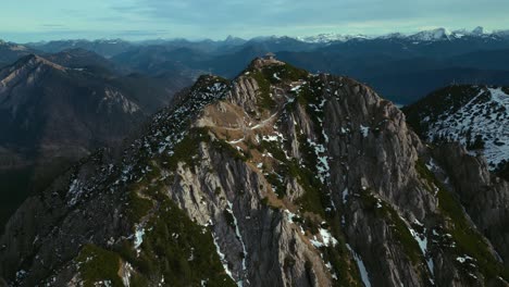 Cinematic-drone-aerial-at-Herzogstand-mountain-top-peak