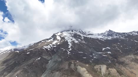 aerial drone shot revealing the untouched wilderness of ladakh’s remote high-altitude mountains.