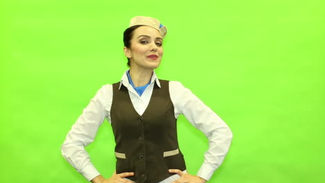 woman in flight attendant uniform on green screen