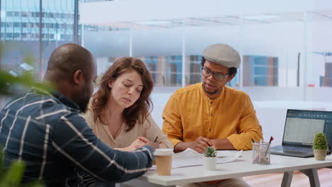 Clients-and-realtor-on-an-office-tour-evaluating-modern-workspace-design