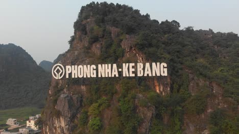 aerial view of big phong nha-ke bang sign on mountain at vietnam