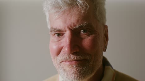 close-up portrait of a smiling older man