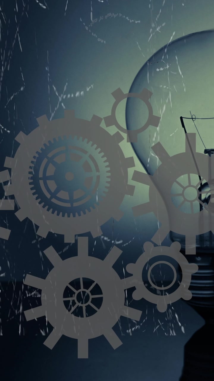 Gears and cogs animation over light bulb, symbolizing innovation and mechanics