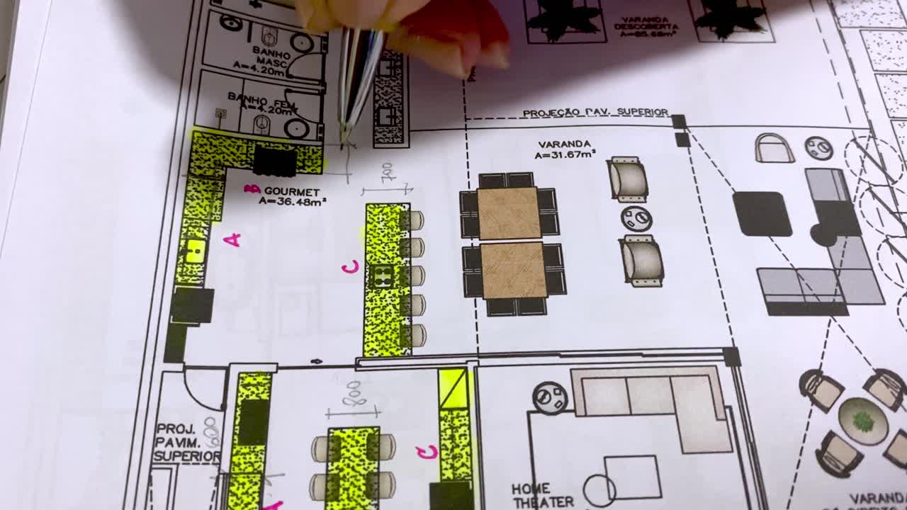 Architect making notes on the blueprints of a home design project