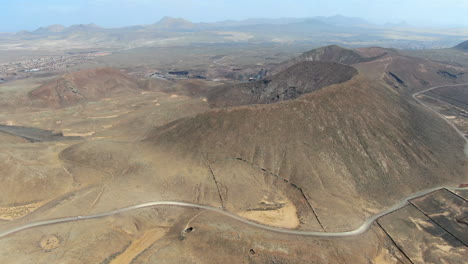 aerial drone panning footage of the calderón hondo volcano in fuerteventura island