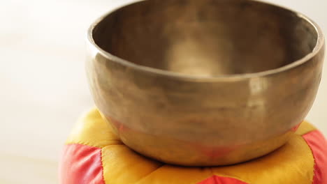 zen bell gong, zen environment, man hand, warm light