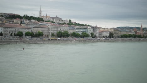 budapest riverfront cityscape on a cloudy day