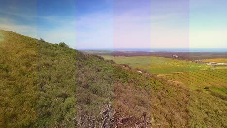 composite image of transparent striped overlay against aerial view of grassland