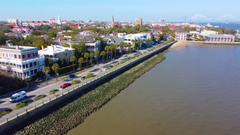 a done shot of the seawall in charleston, sc with the arthur ravenel bridge in the background