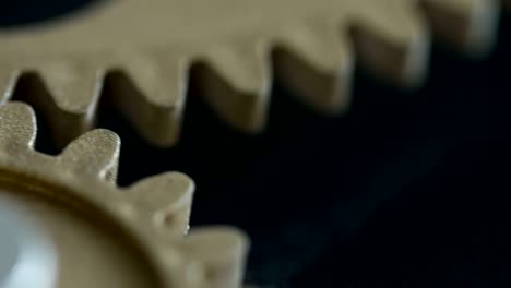 clock mechanism ,wheels running- close up