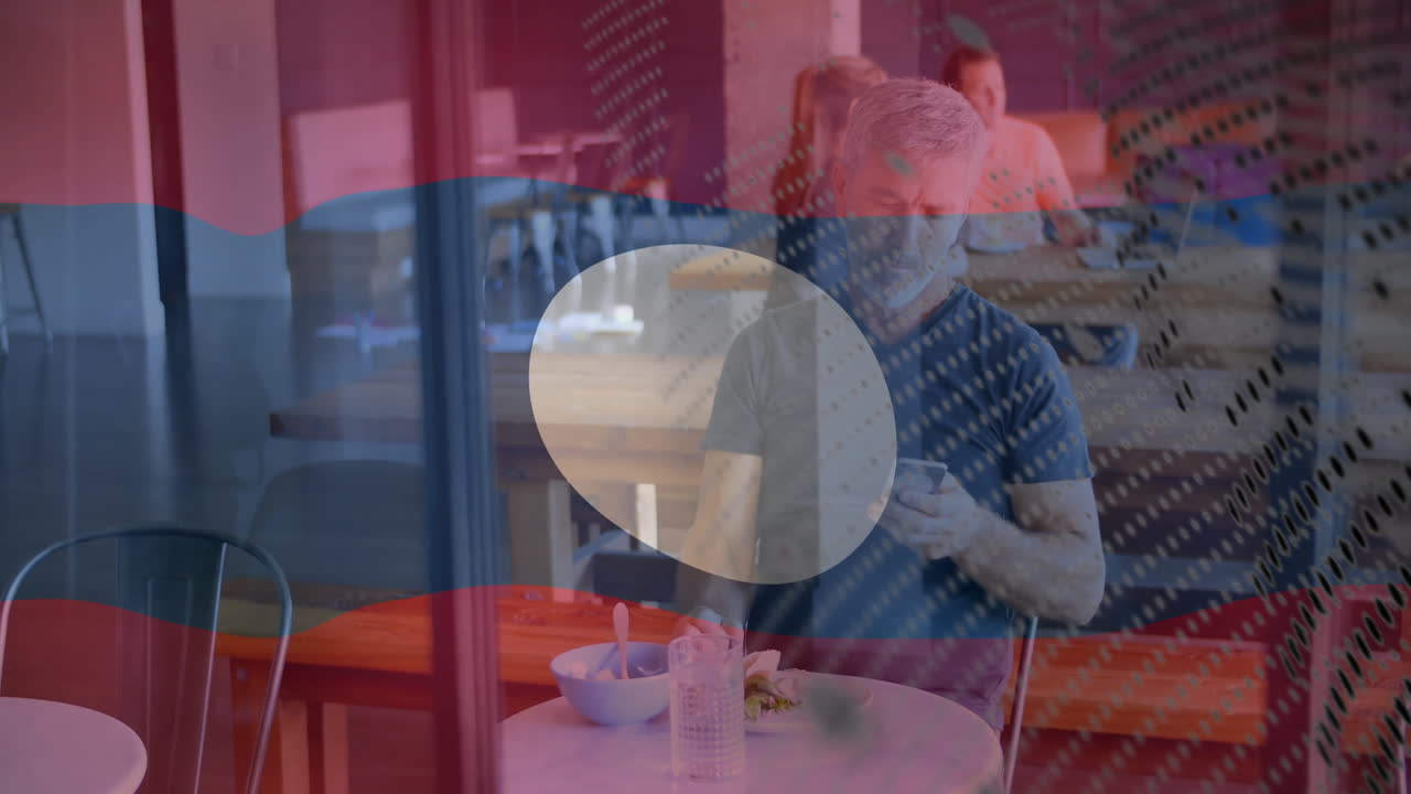 Mature man sitting at café table, tapping smartphone while animated financial chart floating above