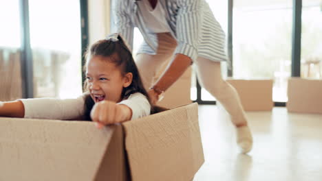 smile, box and playing with family in new house